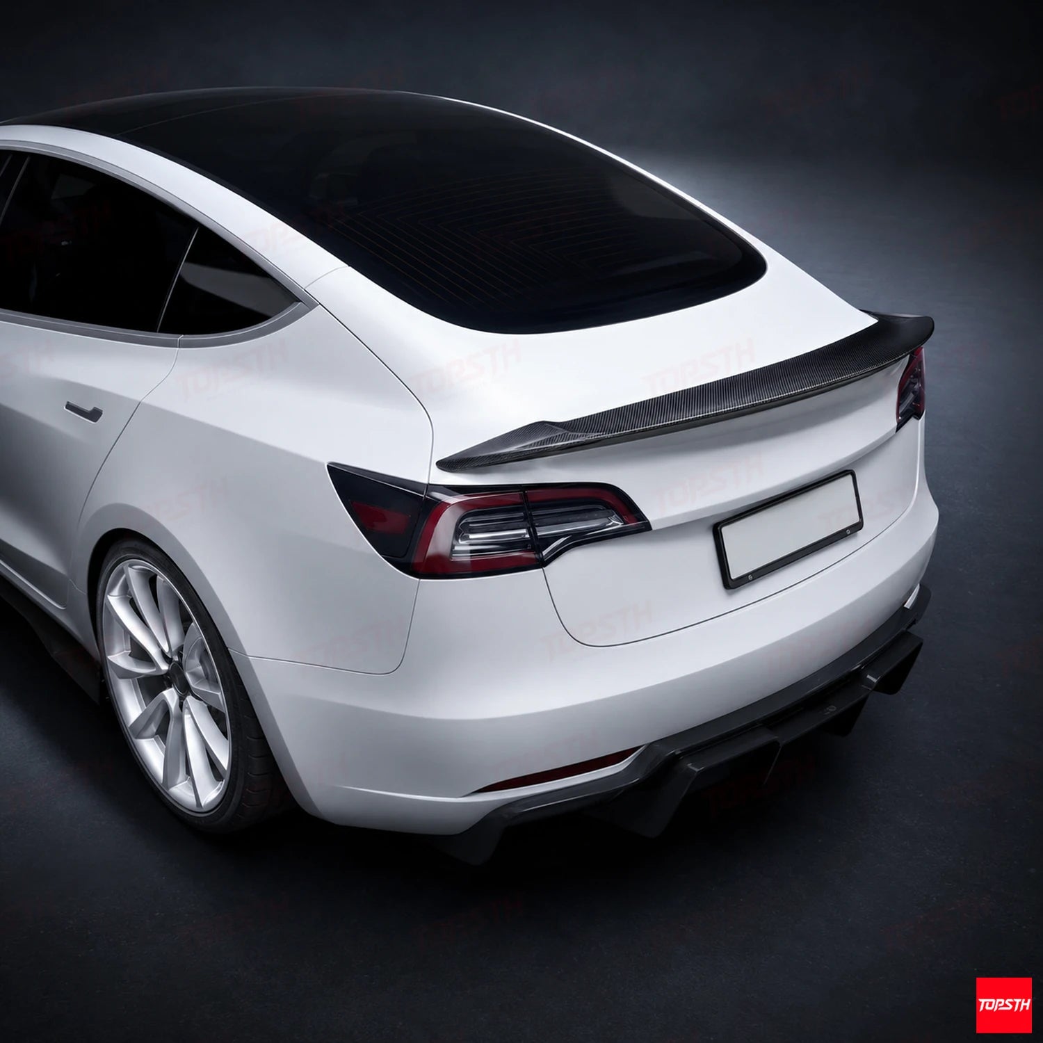 2016-2023 Tesla Model 3 V style Carbon fiber Spoiler elevated rear view by TOPSTH