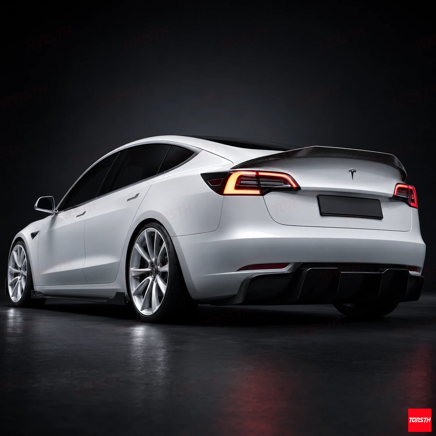 2016-2023 Tesla Model 3 V style Carbon fiber Spoiler low angle rear 3-quarter view by TOPSTH