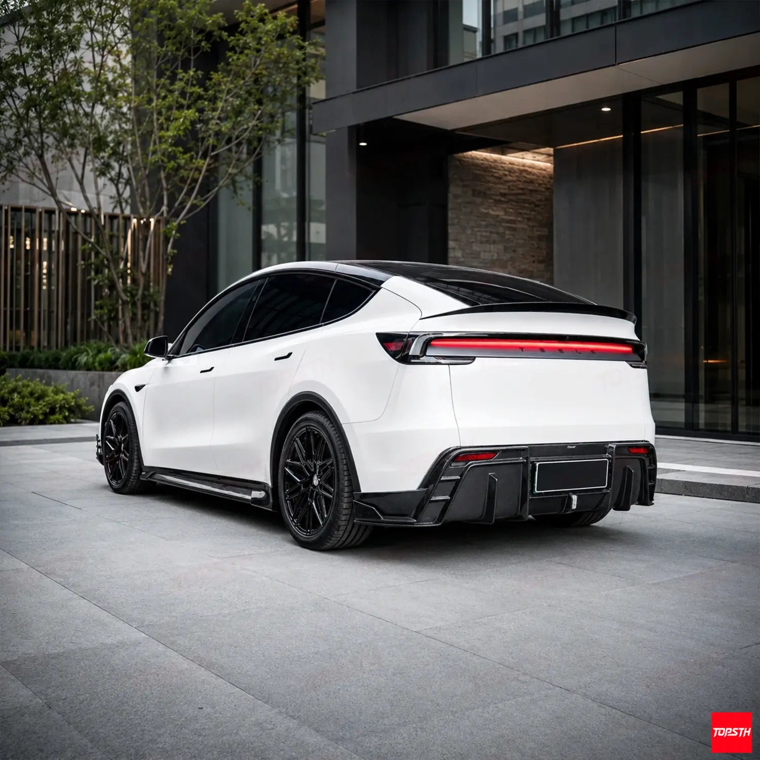 CMST GEN1 Style Carbon Fiber Body Kit for 2025+ Tesla YL/YYY, Rear 3 Quarter View by TOPSTH.