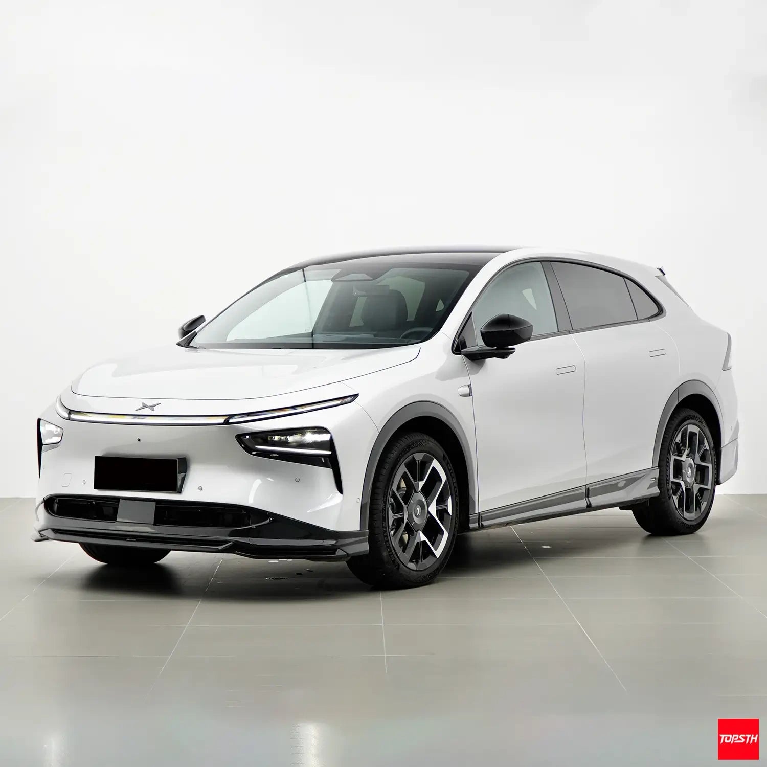 BSKT Style ABS Body Kit for 2025+ XPeng G7, Front 3 Quarter View by TOPSTH.