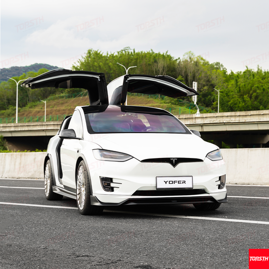 White Tesla Model X (2016-2020) with YOFER Design Full Body Kit installed, featuring falcon wing doors open.