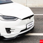 Front close-up of the white Tesla Model X with the installed YOFER Design front bumper lip/splitter.