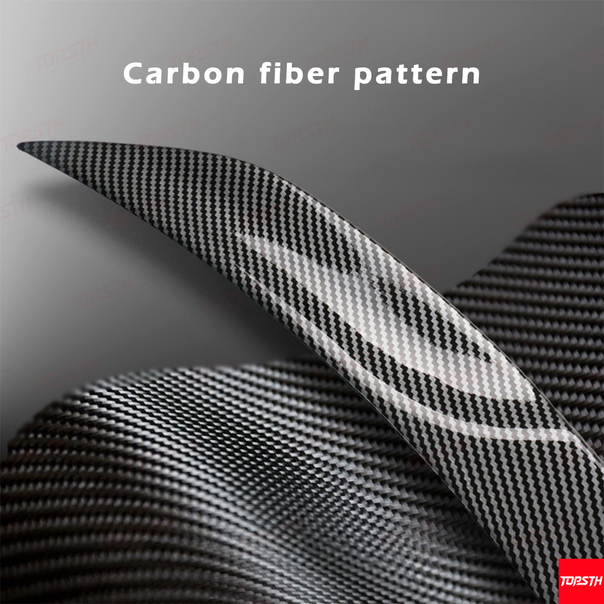 Close-up of the carbon fiber pattern texture on the Tesla Model Y Juniper OEM Performance Pro Style spoiler.