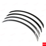 Side view of Four Tesla Model Y Juniper OEM Performance rear spoilers showing the curved design.