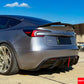 Side-angle detail of the Tesla Model 3 Highland rear diffuser and performance aerodynamic kit.