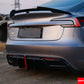 Detailed shot of the ABS rear bumper valance and aerodynamic fins on a Tesla Model 3 Highland.