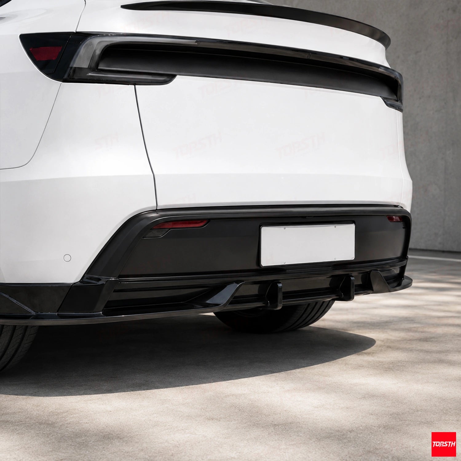 TOPSTH RES Style ABS Body Kit for 2025+ Tesla Model Y juniper, Front 3 Quarter View.