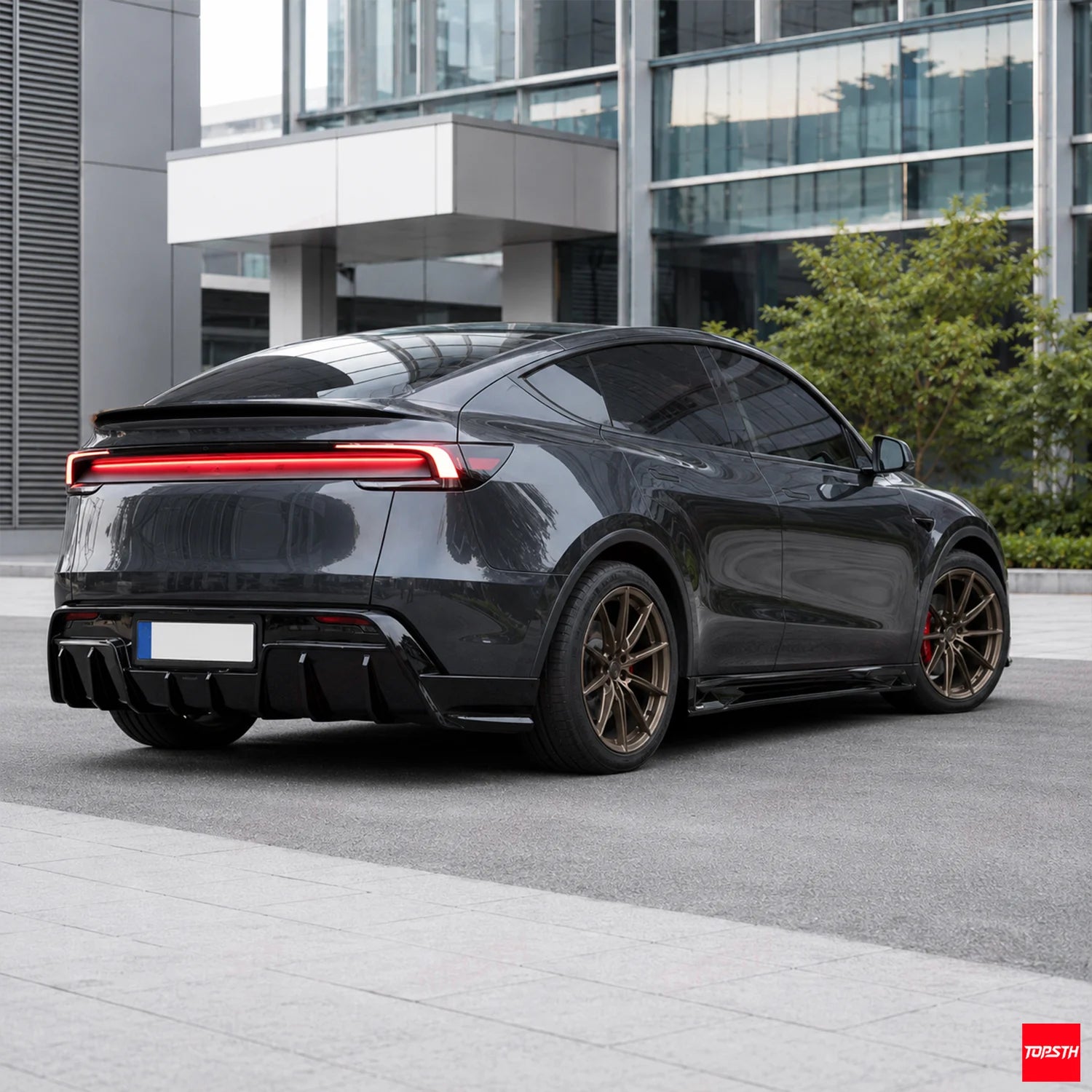 TOPSTH SP Style ABS Body Kit for 2025+ Tesla Model YL/YYY, Rear 3 Quarter View.