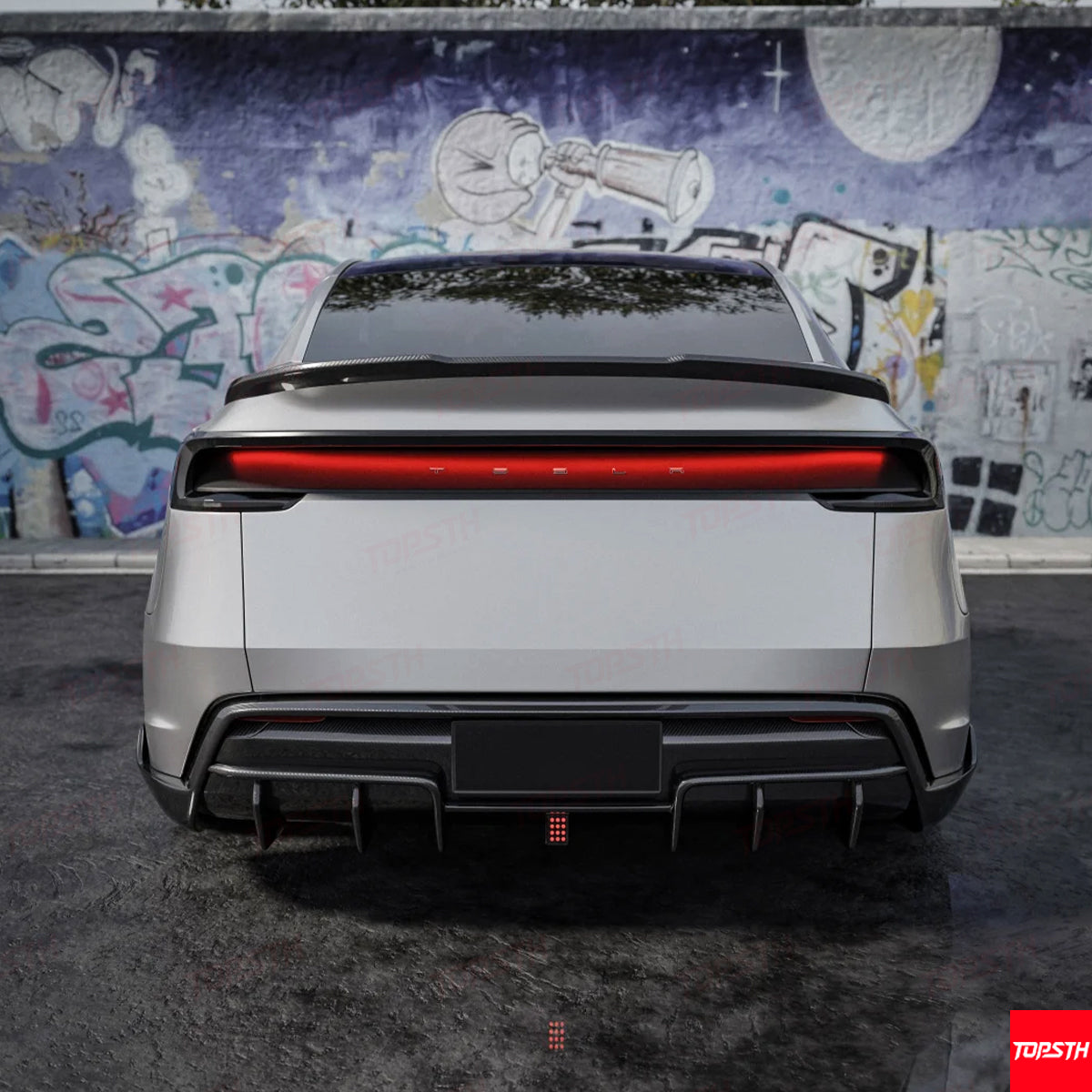Straight rear view of the Tesla Model Y Juniper with the installed Carbon Fiber EL Design Rear Diffuser.
