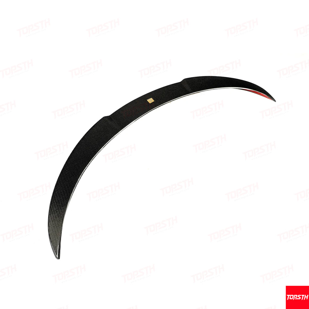 Product shot of the Glossy Carbon Fiber EL Design Rear Spoiler (trunk lip) for Tesla Model Y Juniper.