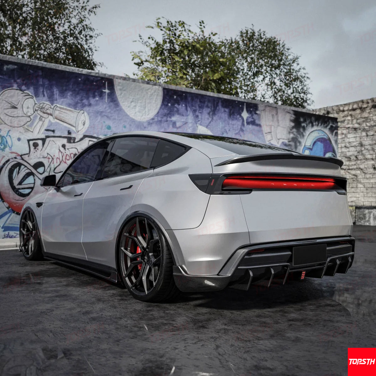 Full three-quarter rear view of the Tesla Model Y Juniper 2025+ with the complete Carbon Fiber EL Design Body Kit.